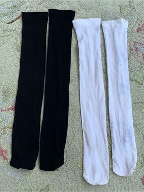 Bundle of two black and white knee high socks
